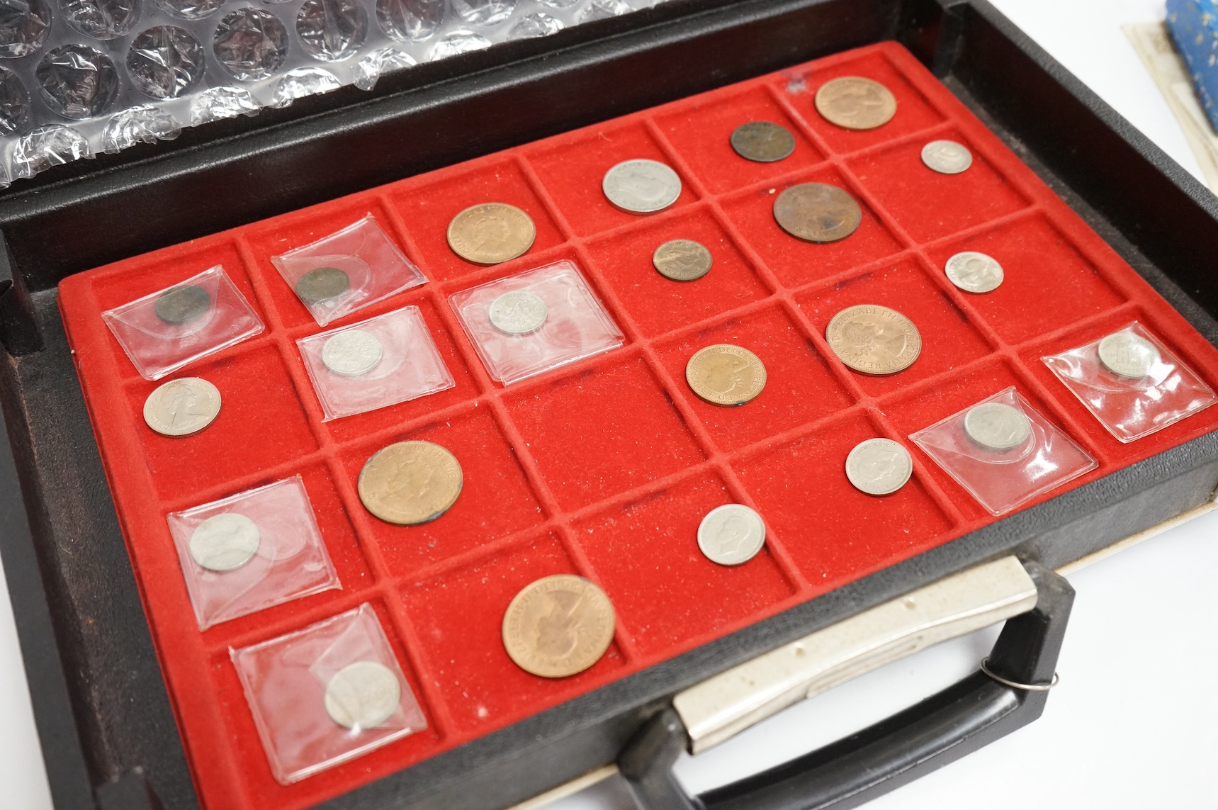 British and world coins and banknotes, including Victoria, double florin 1887, about EF, Latvia 5 silver Lati, 1931, about EF, QE2 silver crown, Victoria to George V florins, shillings etc. France 10 francs 1965 and John